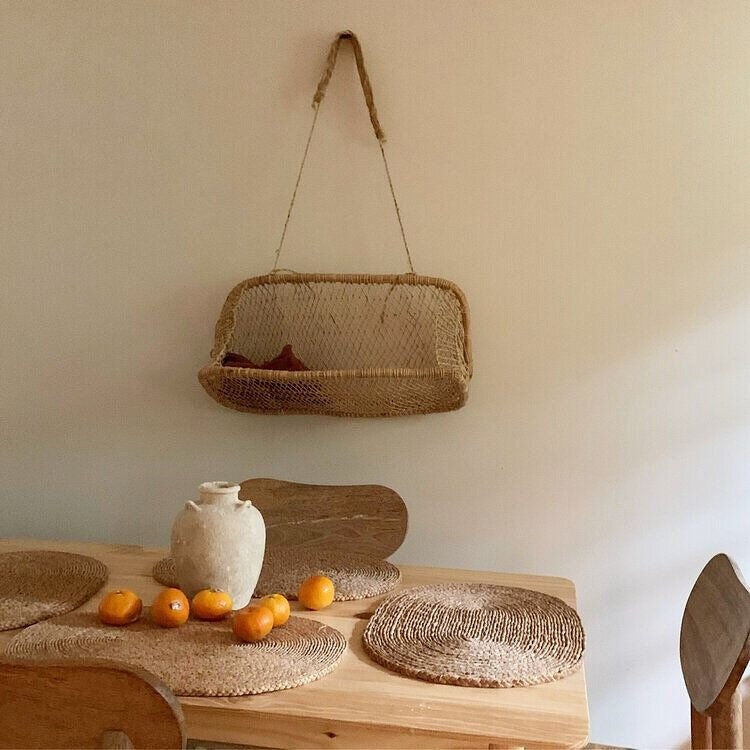 Hanging basket shown in a cozy living space with wooden accents.