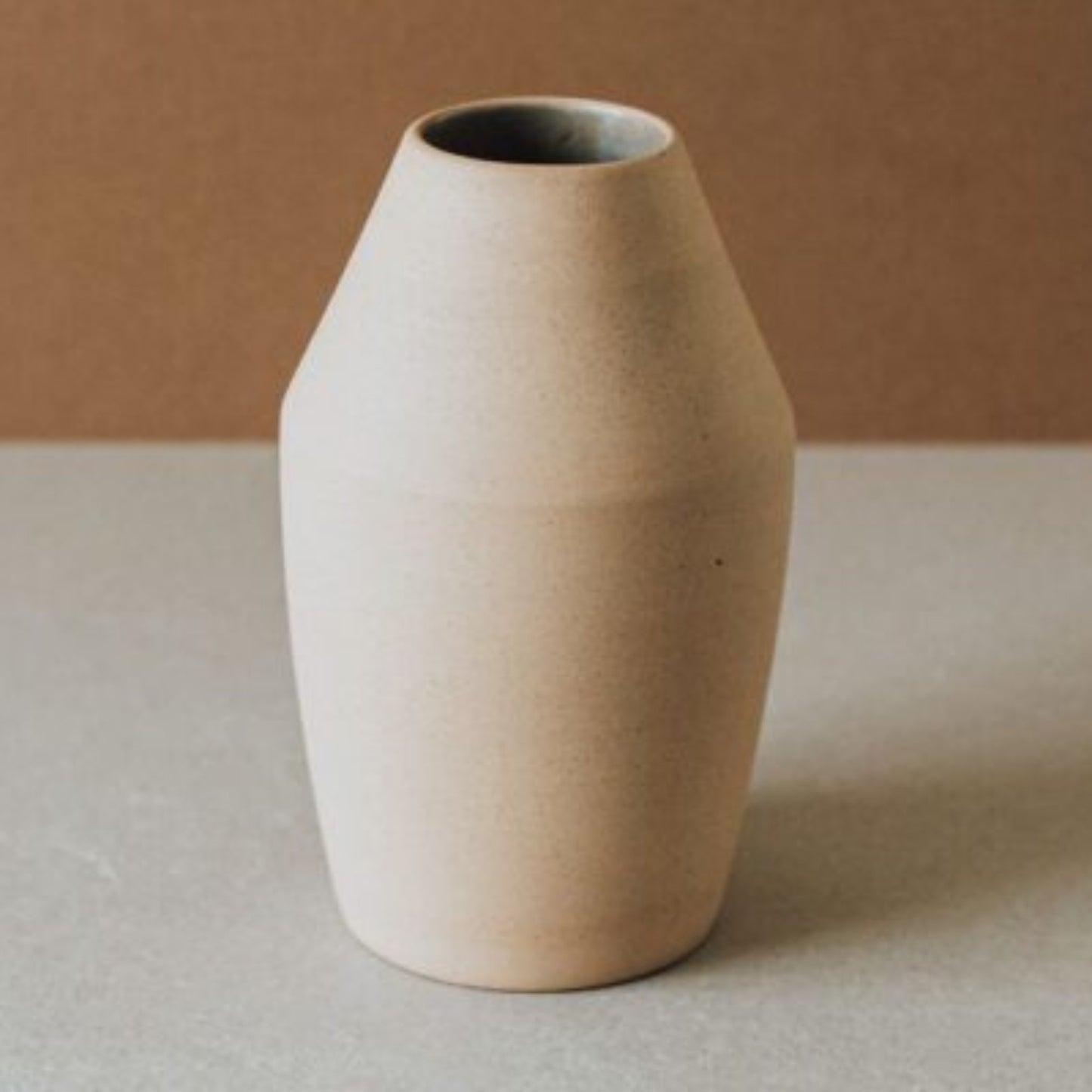 Minimalist conical clay vase in sand tone, handmade Mexican ceramic decor