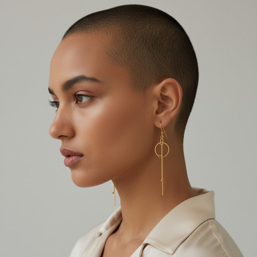 Long hammered dangle earrings with circle and bar design, handcrafted bronze base with gold or silver plating, lightweight artisan jewelry.