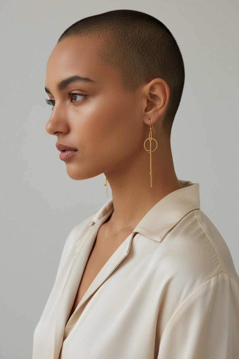 Long hammered dangle earrings with circle and bar design, handcrafted bronze base with gold or silver plating, lightweight artisan jewelry.