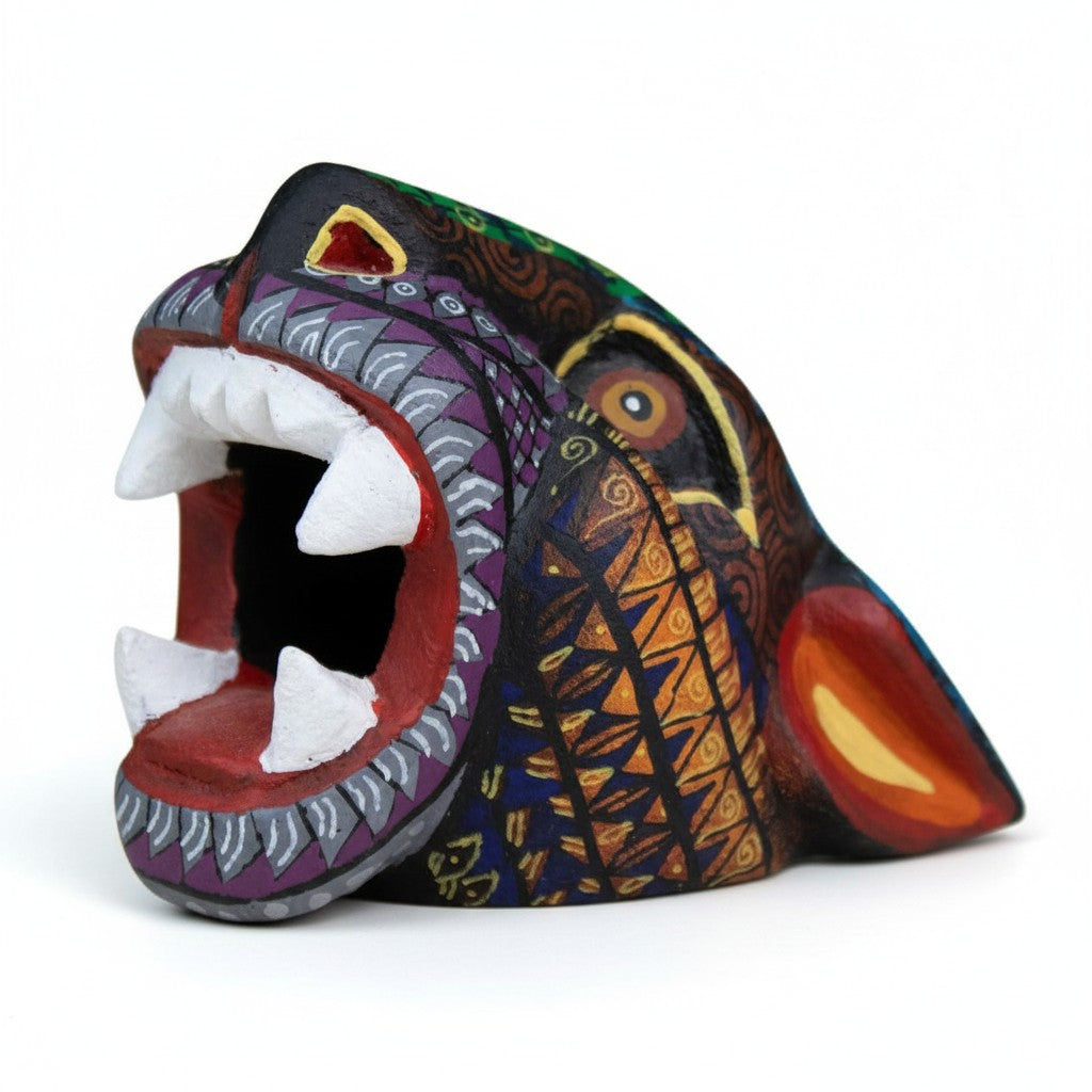 Copal wood jaguar alebrije showing detailed carving and multicolor brushwork