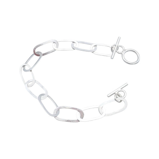 Handcrafted oval link chain bracelet in hammered bronze with gold or silver plating, chunky artisan bracelet with adjustable toggle clasp