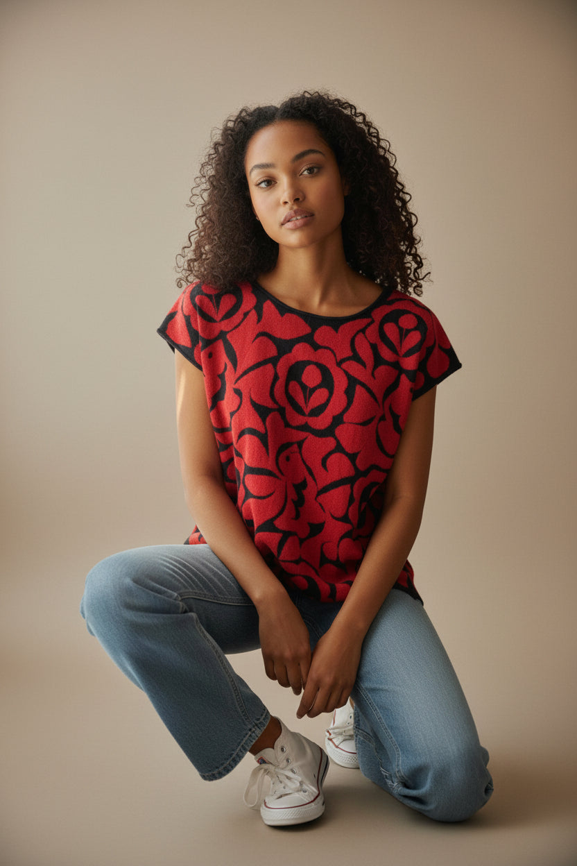 Oaxacan Istmo floral blouse showing relaxed silhouette and breathable cotton-blend knit, casual styling on model