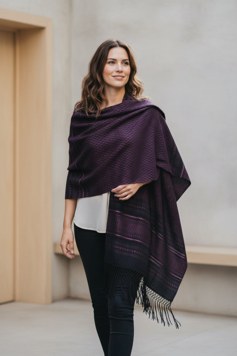 Fuchsia handwoven cotton rebozo shawl styled as an effortless wrap with hand-tied fringe